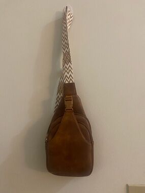 Cluci Brown Sling bag with buckle attachment - Women’s